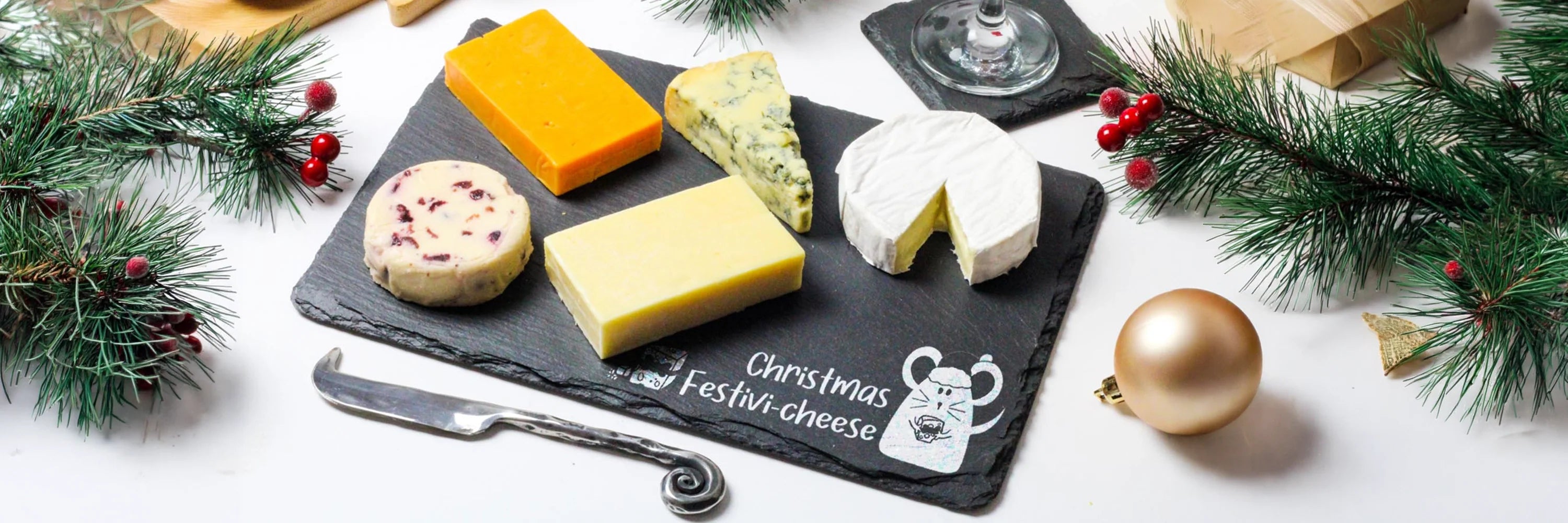Slate Cheese Board with Christmas Mouse Design Engraved on to it.