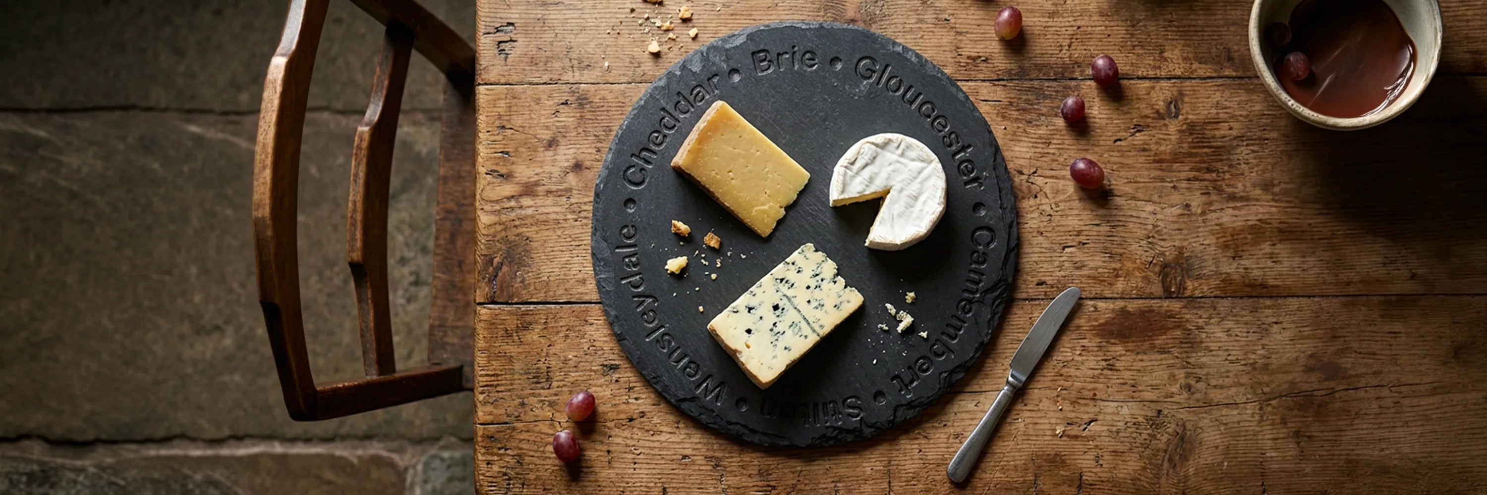 Round Welsh Slate Cheese Board with Cheese Names Deep Engraved on to it