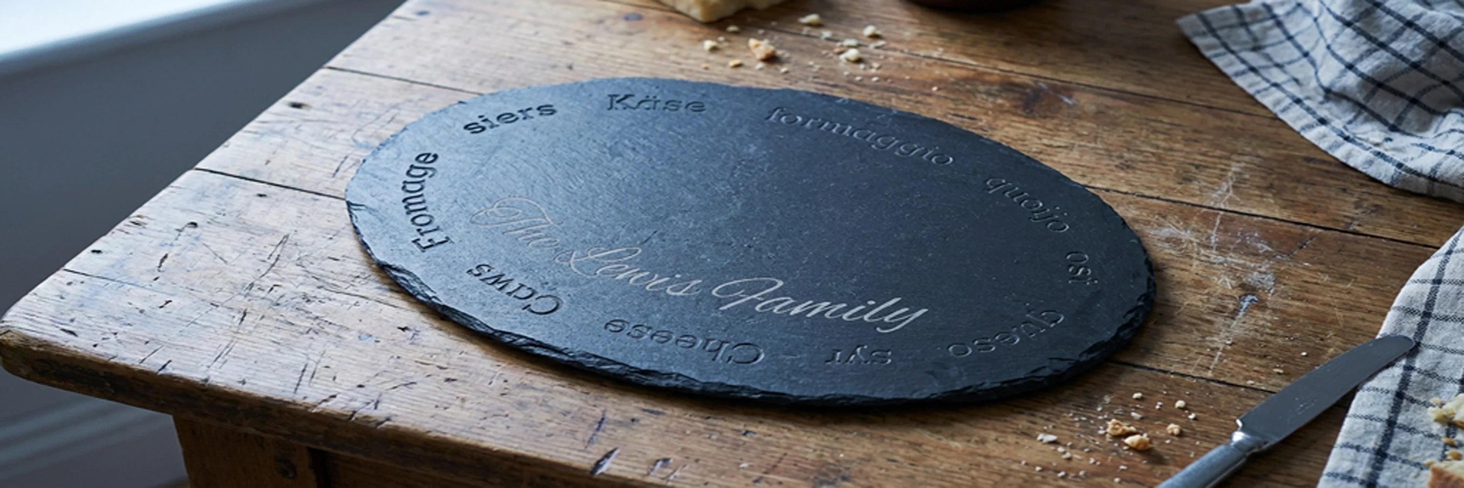 Deep Engraved Oval Slate Cheese Boards with Personalised text on it
