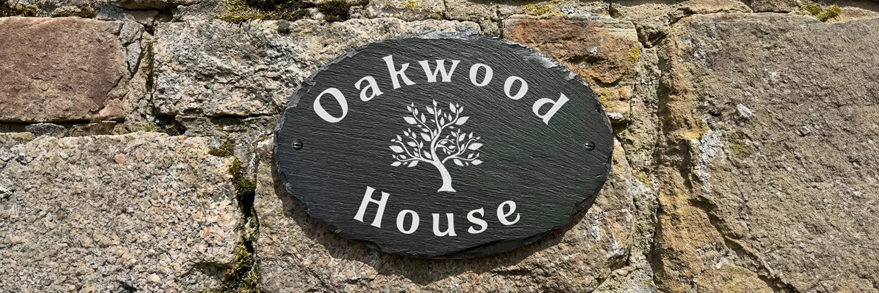 Oval Slate Sign with Personalised text and motif engraved on to it