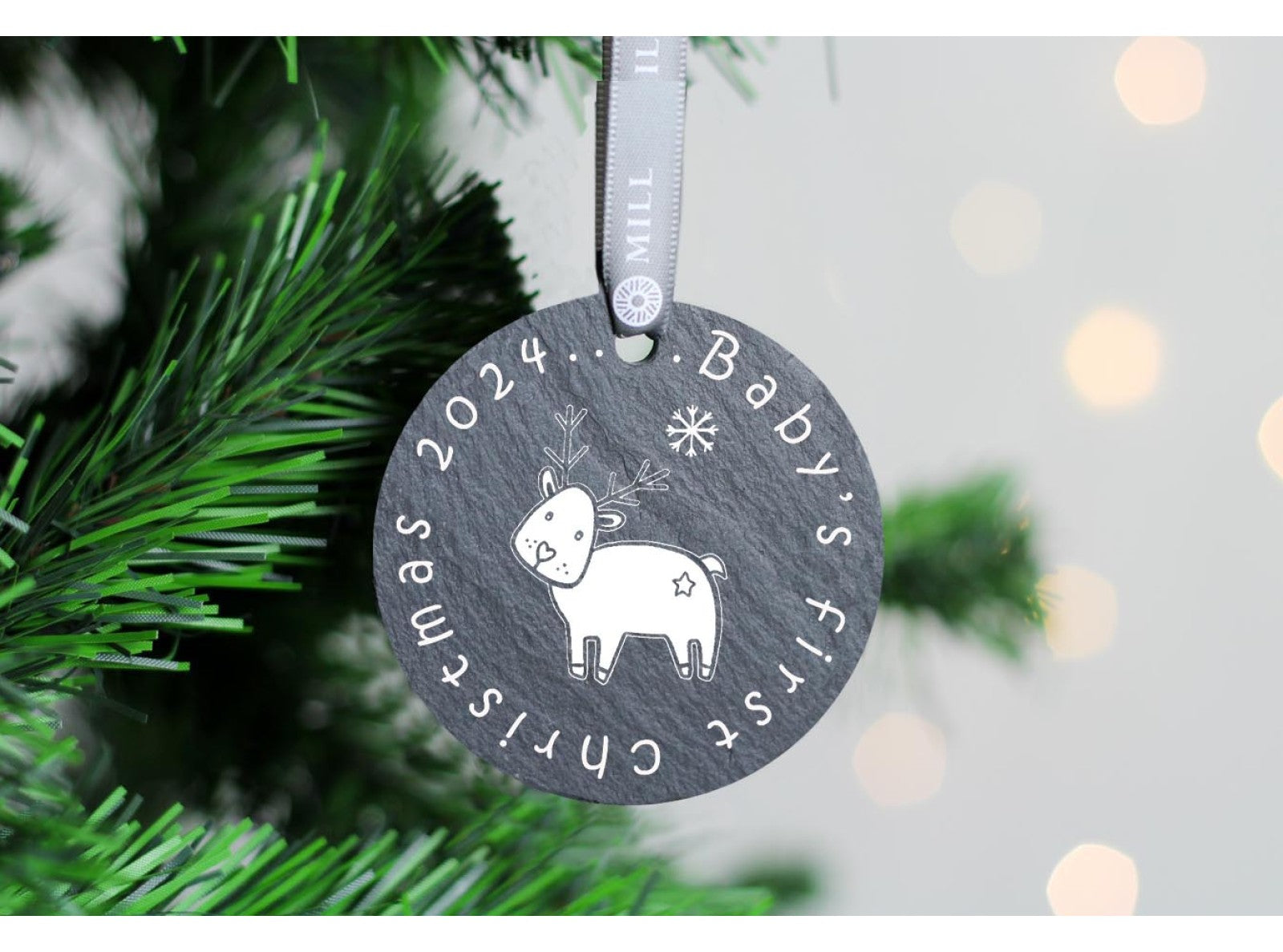 Round welsh slate christmas tree decoration with babies first christmas saying on, reindeer design