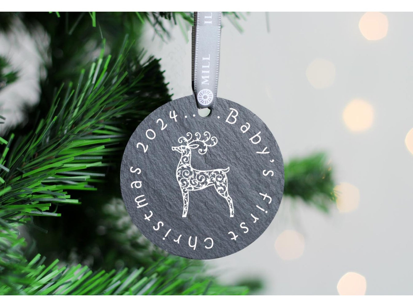 Round welsh slate christmas tree decoration with babies first christmas saying on, snowflake design