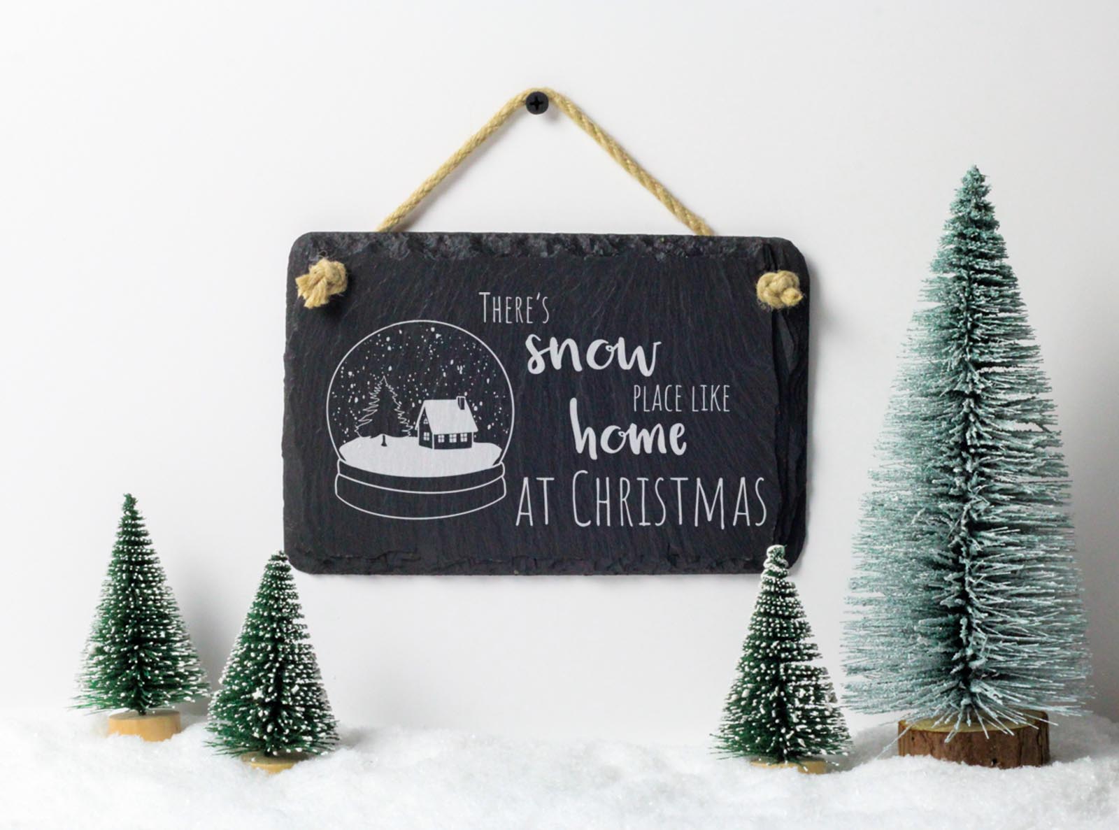 Welsh slate 'There's Snow Place Like Home' hanging christmas sign