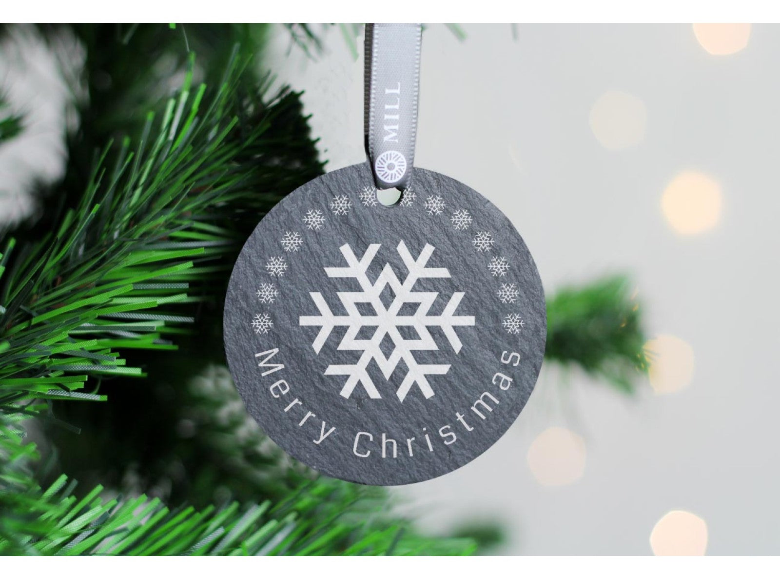 Round welsh slate christmas tree decoration with Merry Christmas snowflake design