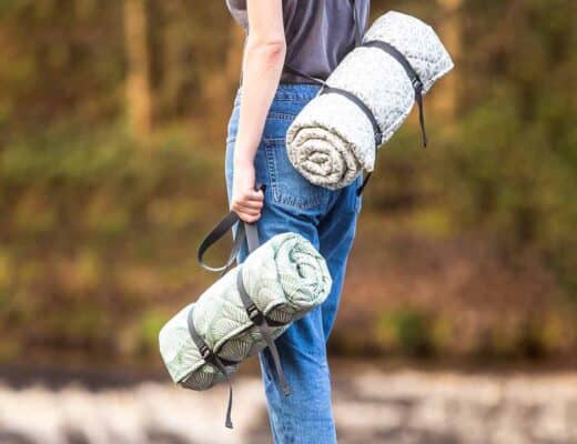 Woman Carrying Newbury Cotton Quilted Picnic Rugs