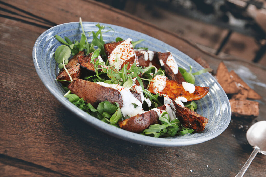 Sweet Potato with watercress and lemon tahini dressing from Charred Genevieve Taylor
