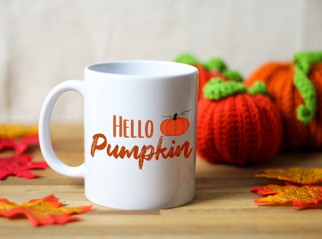 White ceramic mug with the words hello pumpkin and an illustration of a pumkin