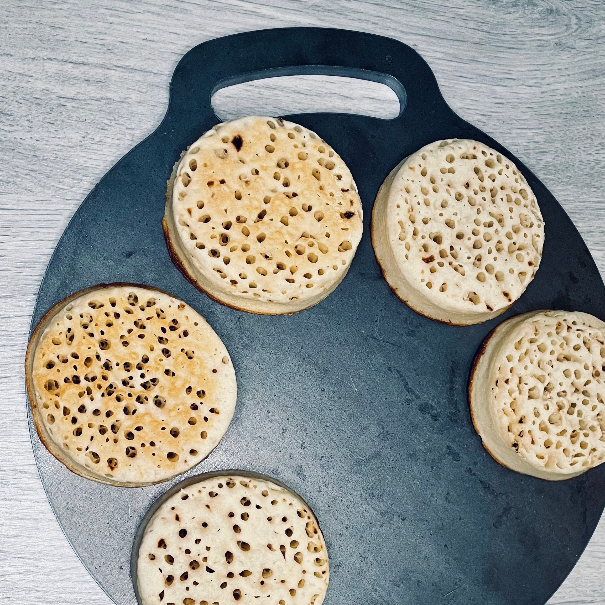 Crumpets on a bakestone