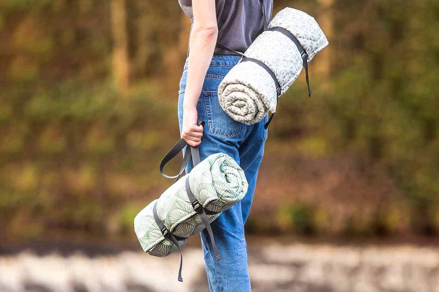 Woman Carrying Newbury Cotton Quilted Picnic Rugs