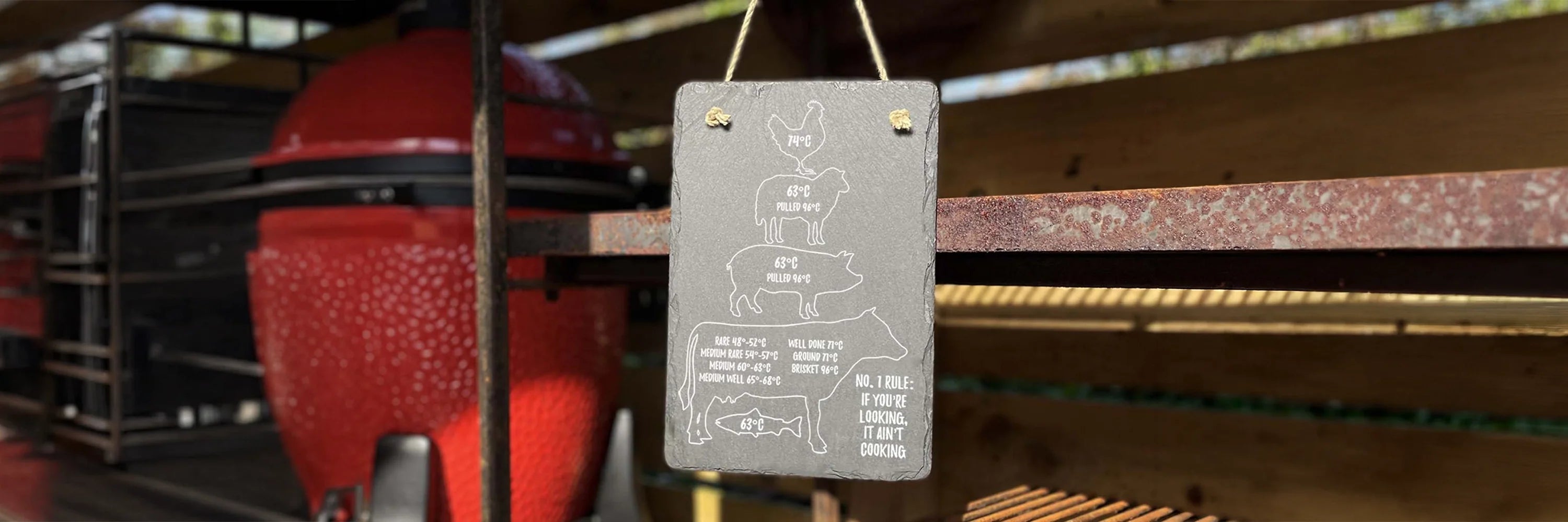 BBQ hanging rope sign with engraved image of verious meat cuts engraved on to it