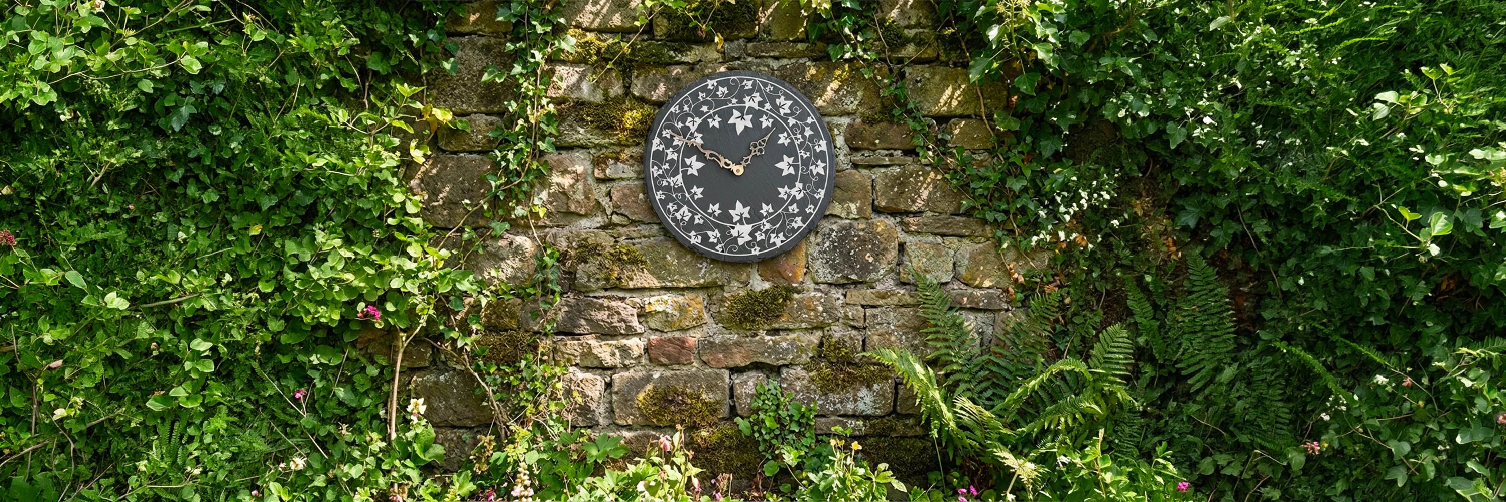 Round Slate Garden Clock with Engraved Ivy Design on to it