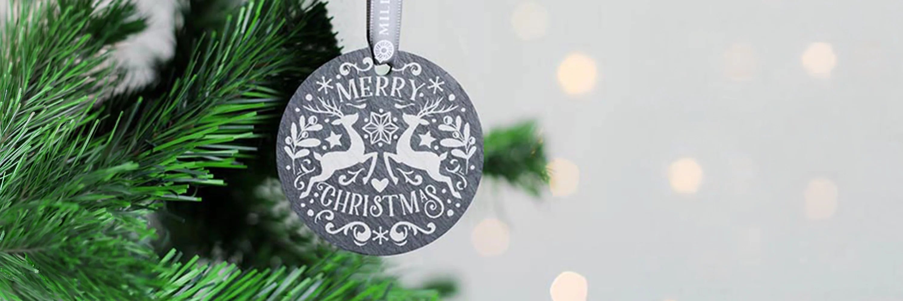 Round Slate Christmas Decoration with Christmas Design Engraved on to it