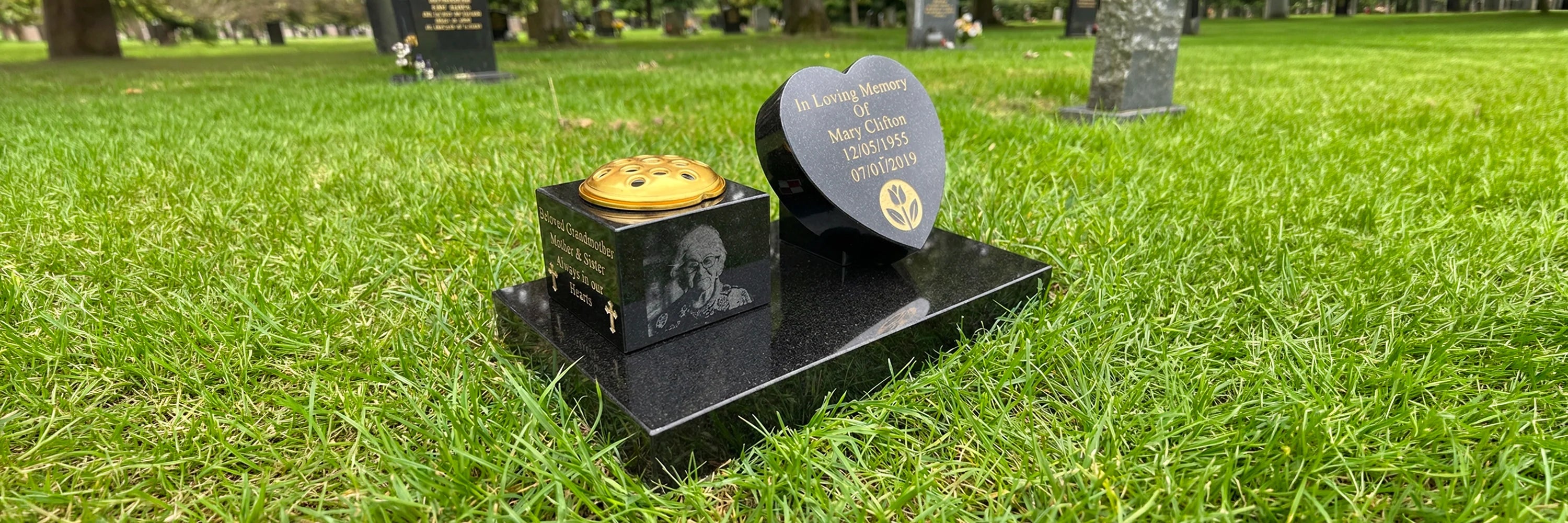 Granite Memorial with Heart Shaped Tilted plaque and vase with gold topper, personalised text and photograph engraved onto it