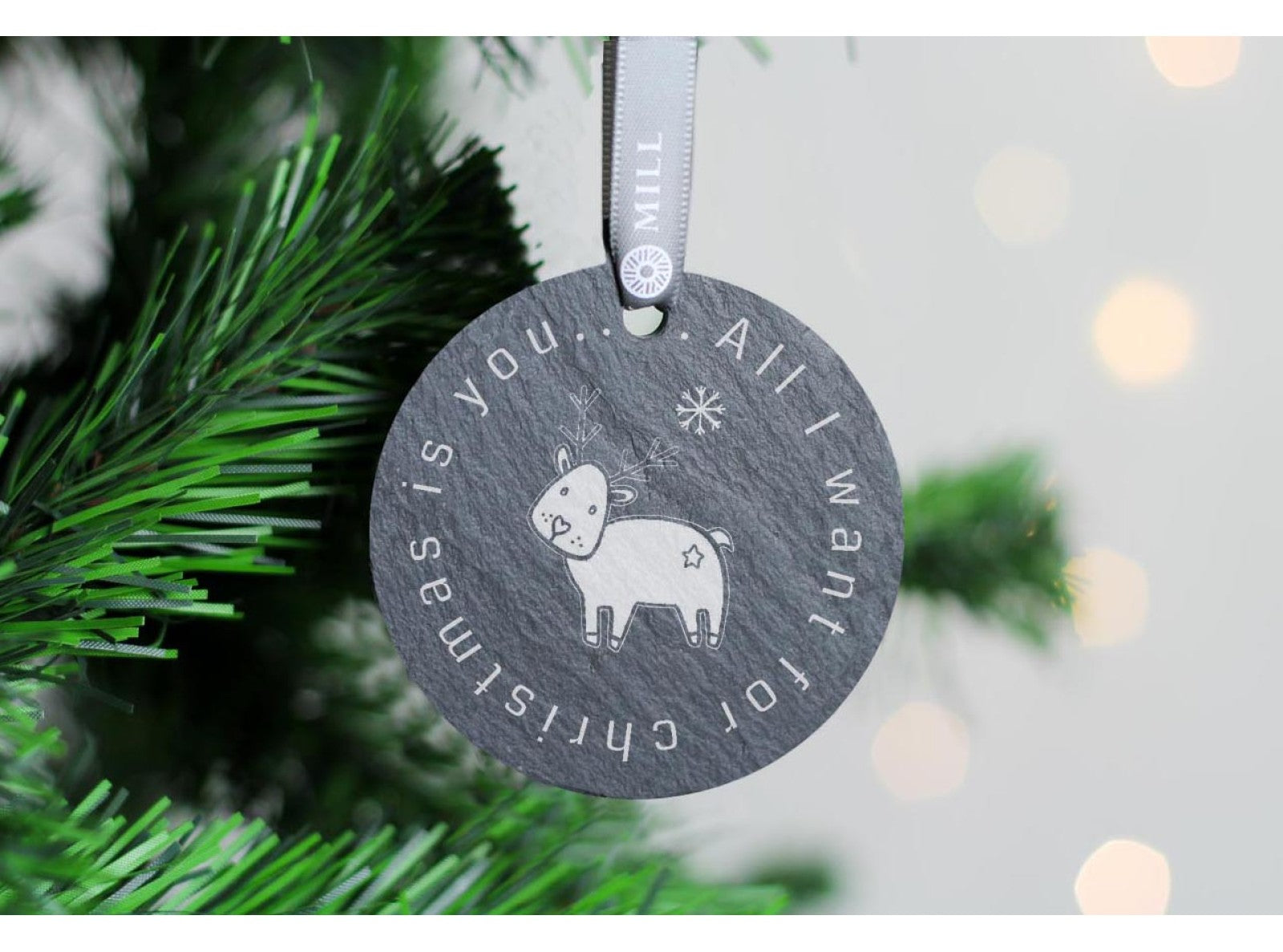 Round welsh slate christmas tree decoration with baby reindeer design on