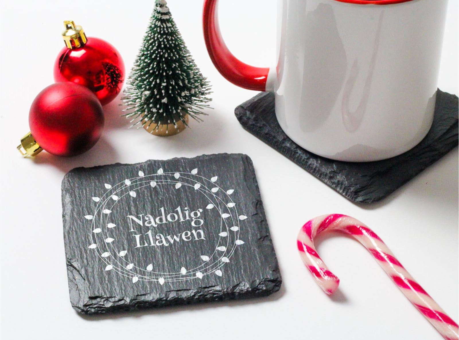 Welsh slate square christmas coaster engraved with Nadolig Llawen' (welsh for merry christmas)