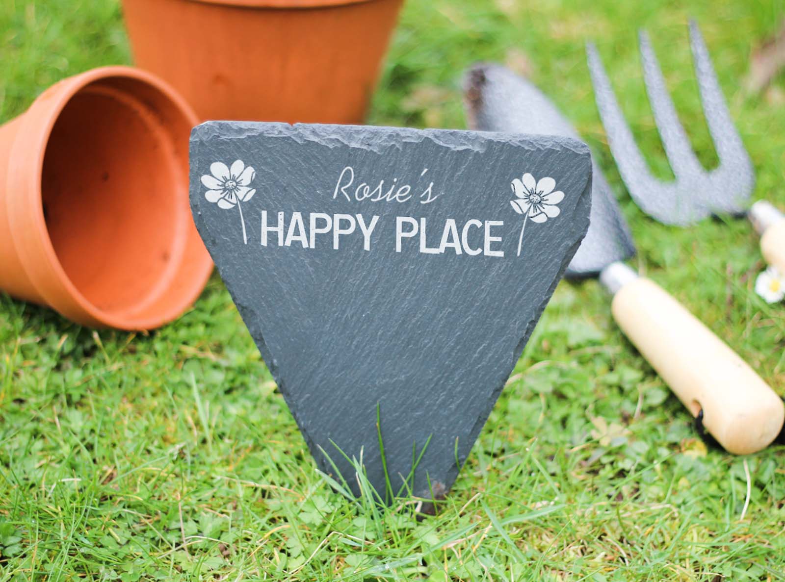 Hand-cut Welsh slate personalised 'happy place' marker, for the ground