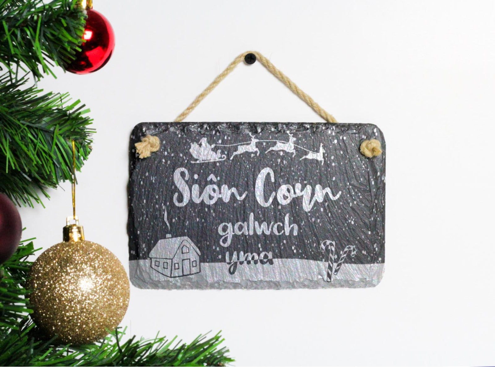 Welsh slate 'santa stop here' in Welsh hanging christmas sign 