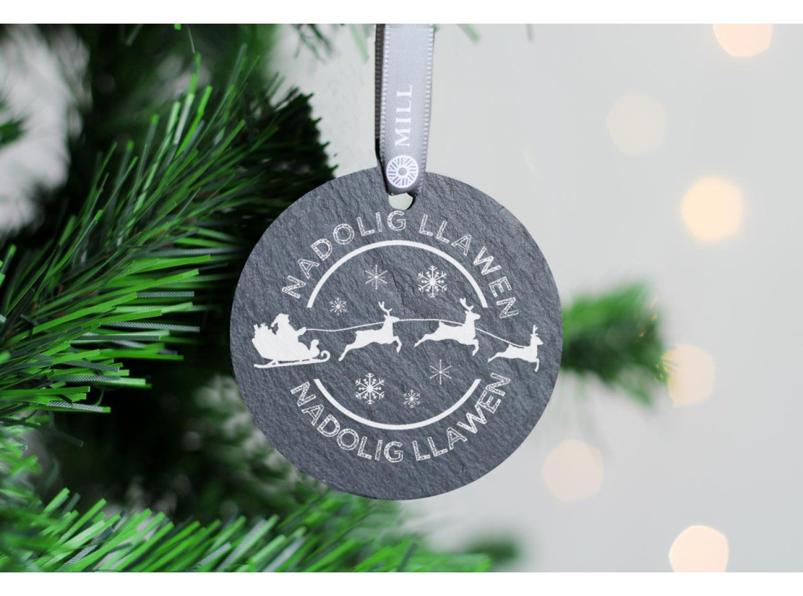 Round welsh slate christmas tree decoration with nadolig Llawen design 
