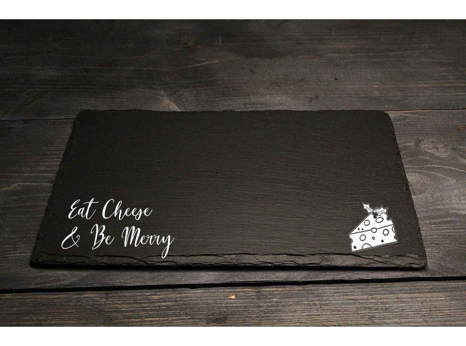 Hand-cut Welsh slate rectangle Christmas cheese board engraved with the words 'Eat cheese and be merry' 