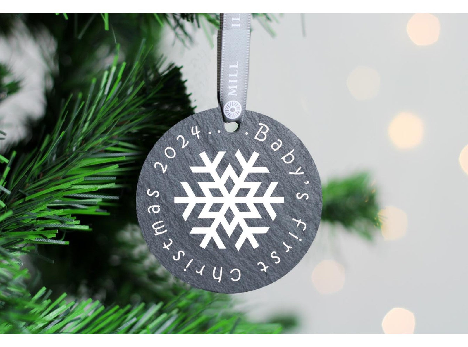 Round welsh slate christmas tree decoration with babies first christmas saying on, snowflake design